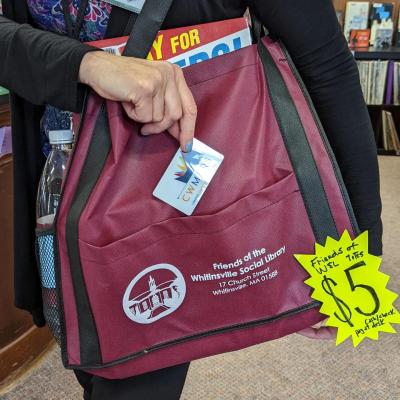 Friends of the Whitinsville Social Library branded reusable tote bag available for $5 at 17 Church Street Whitinsville MA